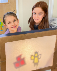 A shadow puppet show performed during afternoon STEM Club, one of Merritt's before and after school programs.
